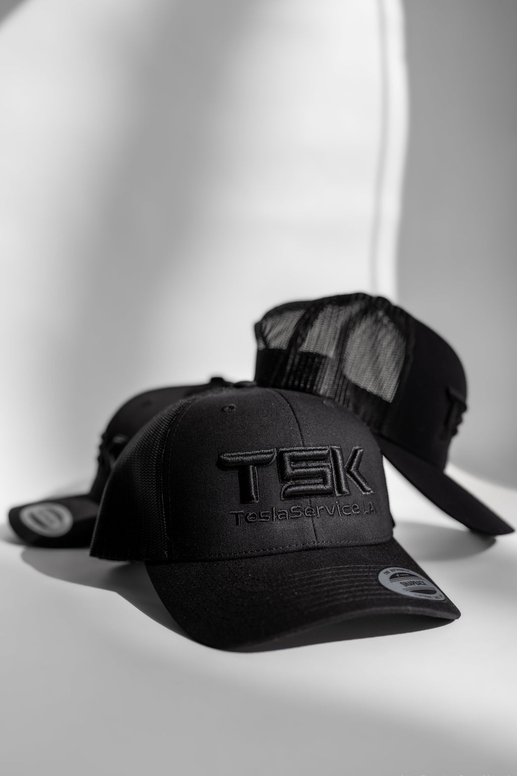 TSK TeslaService.LA Black Trucker Hat